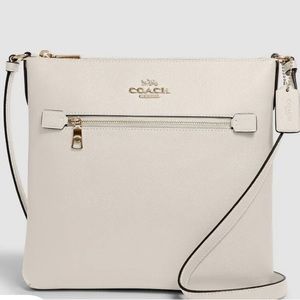 Coach Crossbody with matching wallet.